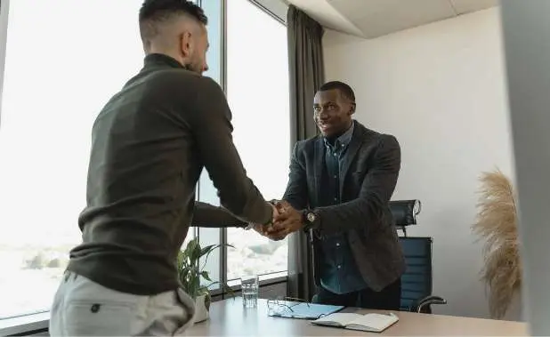 two men shaking hands